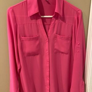 Size small Hot Pink V-Neck blouse. Sleeves can be worn long or rolled